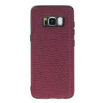 Burgundy leather textured back cover for a smartphone with camera cutout and black bumper edge
